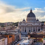 Vatican SNUBS Trump Gaza Peace Board St Peters Basilica with surrounding cityscape at sunset