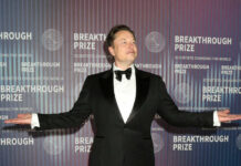 Man at Breakthrough Prize event in formal attire.