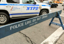 Cancer Hospital’s TERROR: Bomb Threat Shocks NYC NYPD police barricade on city street with vehicles