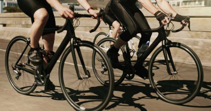 Cyclists riding on a road in motion
