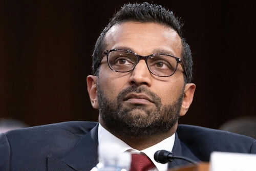 kash-patel2581155557jpg Man wearing glasses in a suit looking thoughtful
