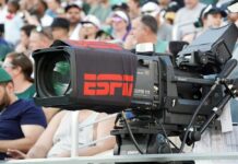 Broadcast camera with ESPN branding at a sports event