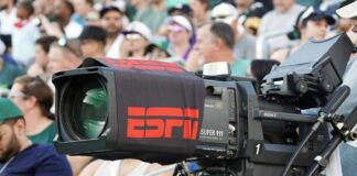 Broadcast camera with ESPN branding at a sports event