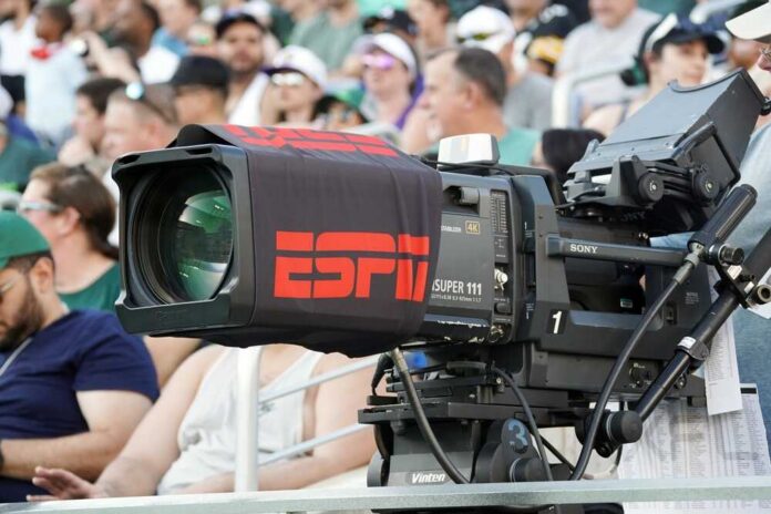 Broadcast camera with ESPN branding at a sports event