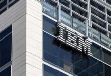 Close-up of the IBM logo on a modern corporate building