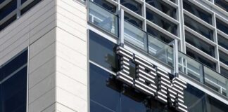 Close-up of the IBM logo on a modern corporate building
