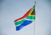 South African flag waving against a clear sky