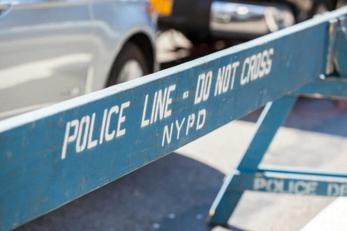 59553801 Blue NYPD barricade with Police Line - Do Not Cross.