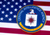 Ex-CIA Exec BUSTED — $40M Gold Hoard and Years of Lies CIA emblem on top of American flag.