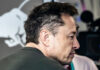 man in profile with short dark hair