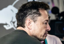 man in profile with short dark hair