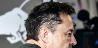man in profile with short dark hair