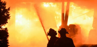 Firefighters battling intense blaze at night scene