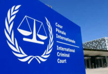 International Criminal Court sign with scales of justice.