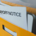 State Dept. Shakeup: Loyalty over Expertise? A yellow folder containing a layoff notice and other documents