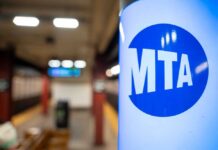 Union Strike Paralyzes NYC’s Major Rail Line MTA sign in a subway station with blurred background