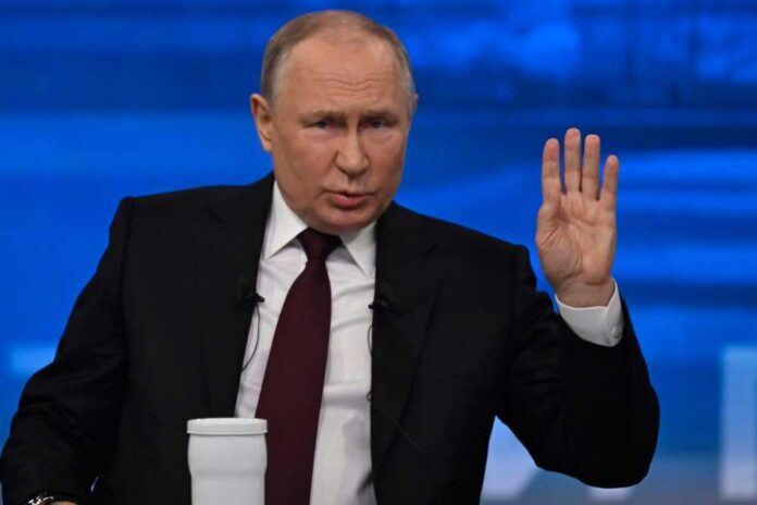 A political leader gesturing during a press conference