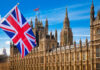 UK’s Gulf Agreement: Bold Move or Sneaky Play? British flag waving in front of the Parliament building in London