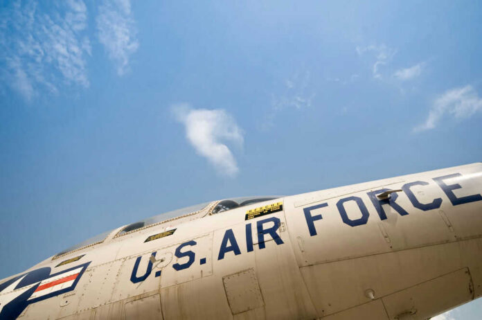 U.S. Air Force aircraft under a clear sky.