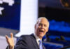 Capitol Showdown Over ‘Failure To Warn’ Man speaking passionately at a podium on stage
