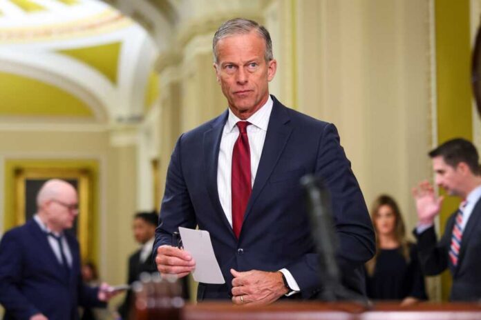 Washington,,Dc,,Usa,-,February,11,,2025:,Senate,Majority,Leader A government official holding a document in a formal setting