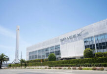 Cafeteria Millionaires? SpaceX Stuns Wall Street SpaceX headquarters with Falcon 9 booster displayed outside