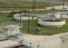 Wastewater treatment plant with circular clarifier tanks