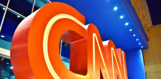 CNN logo sculpture outside building entrance