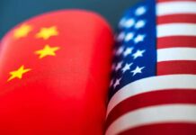 Chinese and American flags side by side
