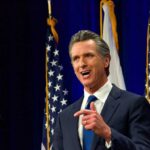 Newsom Targets Ballots, Sparks Constitutional Fight California governor speaking at a construction site with smiling attendees