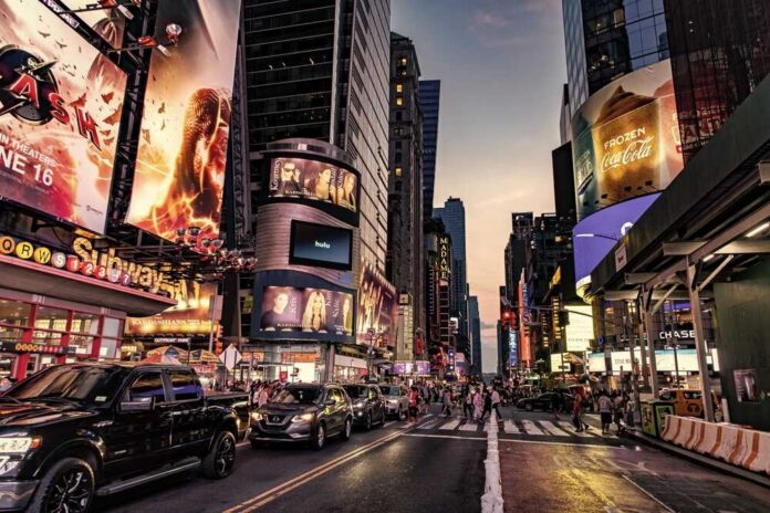 New,York,City,,Usa,-,June,11,,2023:,Times,Square Busy street scene in Times Square with cars and pedestrians