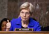 Warren Slams Chip Giant Over China Risk A senator giving a thumbs up during a hearing