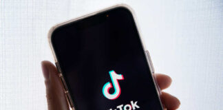 Smartphone displaying TikTok app logo on screen