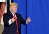 Trumpapalooza Ignites Dallas — What’s The Play? man in suit giving two thumbs up