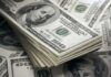 Stack of US 100 dollar bills