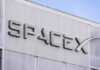 Starship SURVIVES — What Did SpaceX Find? SpaceX logo on a building facade