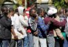 Grace Period GONE — Enforcement Takes Over Group of men standing in a line outdoors