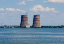 Cooling towers of a power plant by a wide river