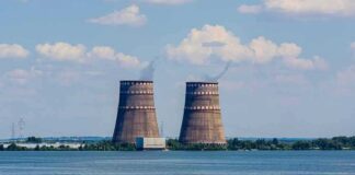 Cooling towers of a power plant by a wide river