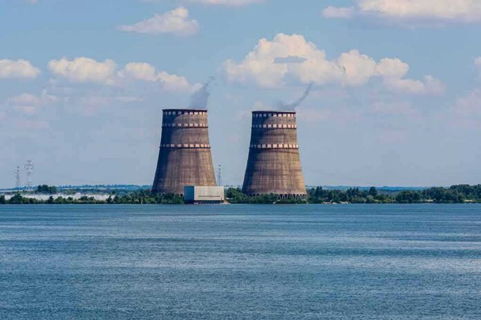 Cooling towers of a power plant by a wide river