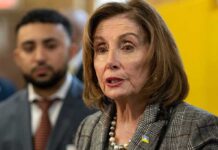 Weaponized Justice? Pelosi Torches Blanche Vote woman speaking at event with blurred attendees behind