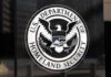 Record ICE Blitz – DHS Escalation Hits Overdrive U.S. Department of Homeland Security seal on a building plaque