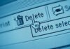 Emails Shredded: FOIA Dodge Hits Fauci Circle Close-up of a computer screen showing a delete button with a cursor hovering over it