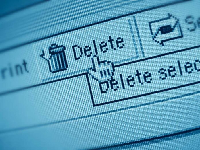 Delete,Button Close-up of a computer screen showing a delete button with a cursor hovering over it