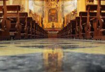 Sanctuary Staked Out – Plates Ran, Cameras Roll Church interior with wooden pews facing ornate altar