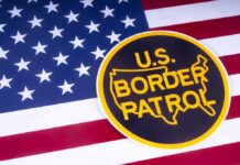 Packed Boat – Air Patrol Nabs Mystery Migrant Run U.S. Border Patrol emblem on American flag