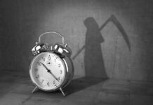 Safeguards Shredded – Assisted Dying Sinks alarm clock with grim reaper shadow