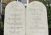 Stone tablets of the Ten Commandments outside a building