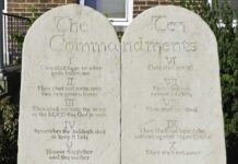 Stone tablets of the Ten Commandments outside a building