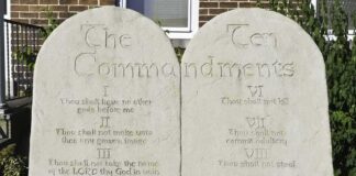 Stone tablets of the Ten Commandments outside a building
